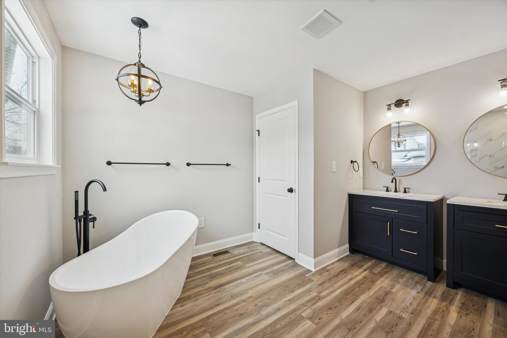 19 Rivanna Road New Castle, DE 19720 - Photo 21 of 26 a bathroom with a granite countertop toilet sink and mirror