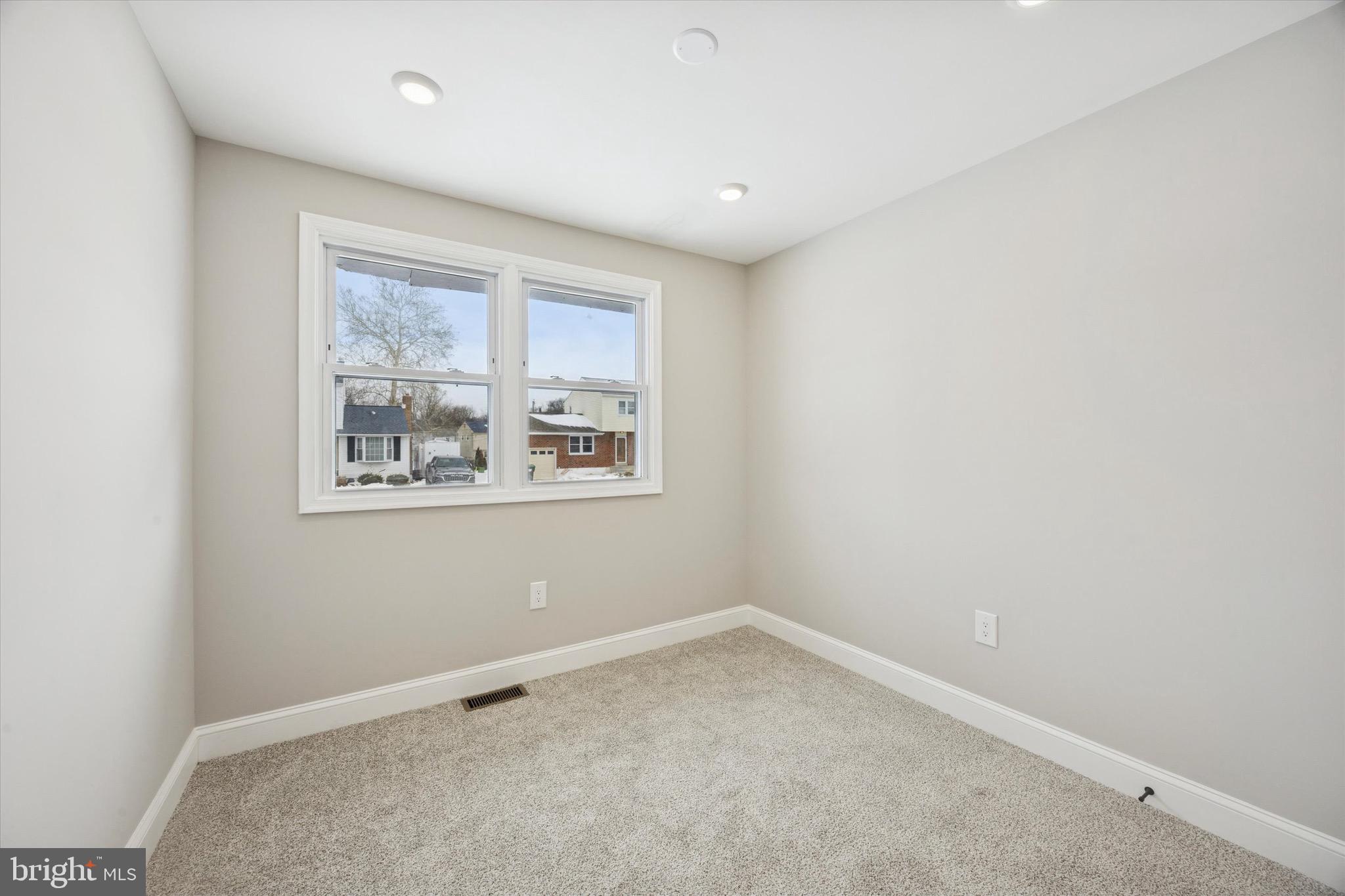 19 Rivanna Road New Castle, DE 19720 - Photo 10 of 26 an empty room with windows