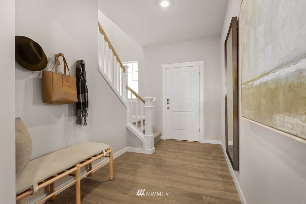 17 180th Place Southeast, Unit 42 Bothell, WA 98012 - Photo 3 of 38 a view of entryway with wooden floor