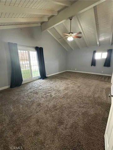 a view of a big room with carpet
