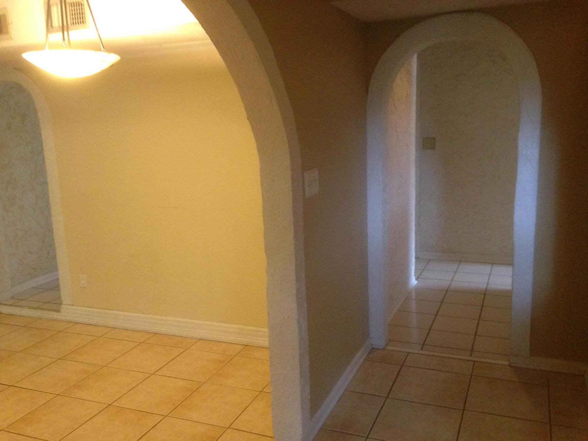 226 Country Club Road Shalimar, FL 32579 - Photo 12 of 35 a view of a hallway with a bathroom