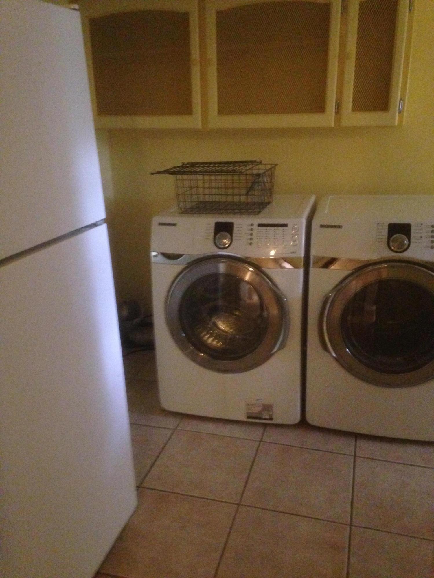 226 Country Club Road Shalimar, FL 32579 - Photo 15 of 35 a utility room with dryer and washer