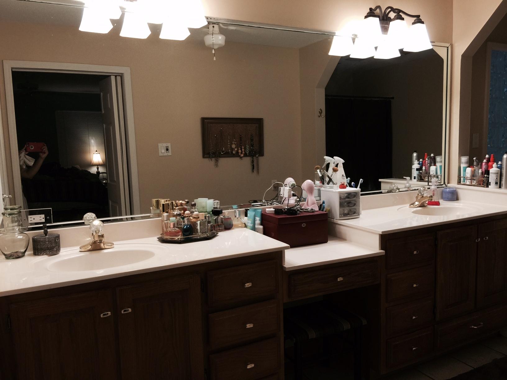 226 Country Club Road Shalimar, FL 32579 - Photo 28 of 35 a bathroom with double sink and a mirror
