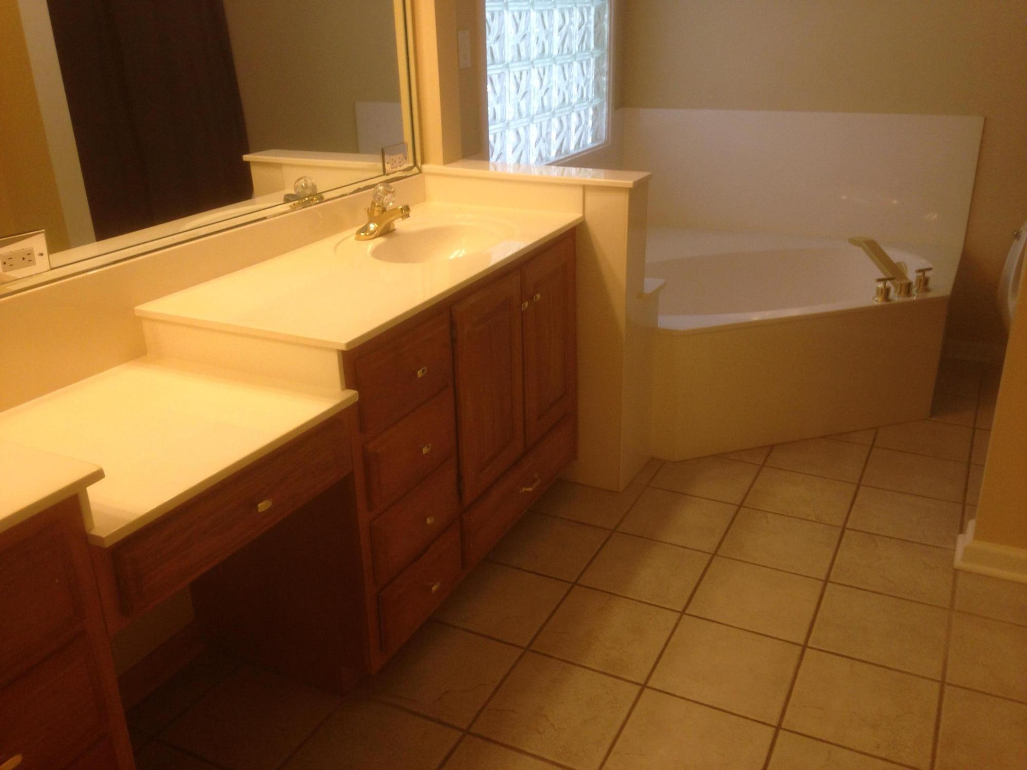 226 Country Club Road Shalimar, FL 32579 - Photo 29 of 35 a bathroom with a sink and a bathtub