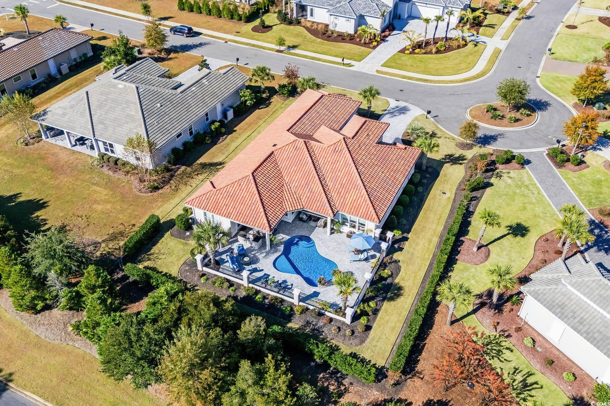 2225 Macerata Loop Myrtle Beach, SC 29579 - Photo 2 of 40 Aerial view of residential area with a pool