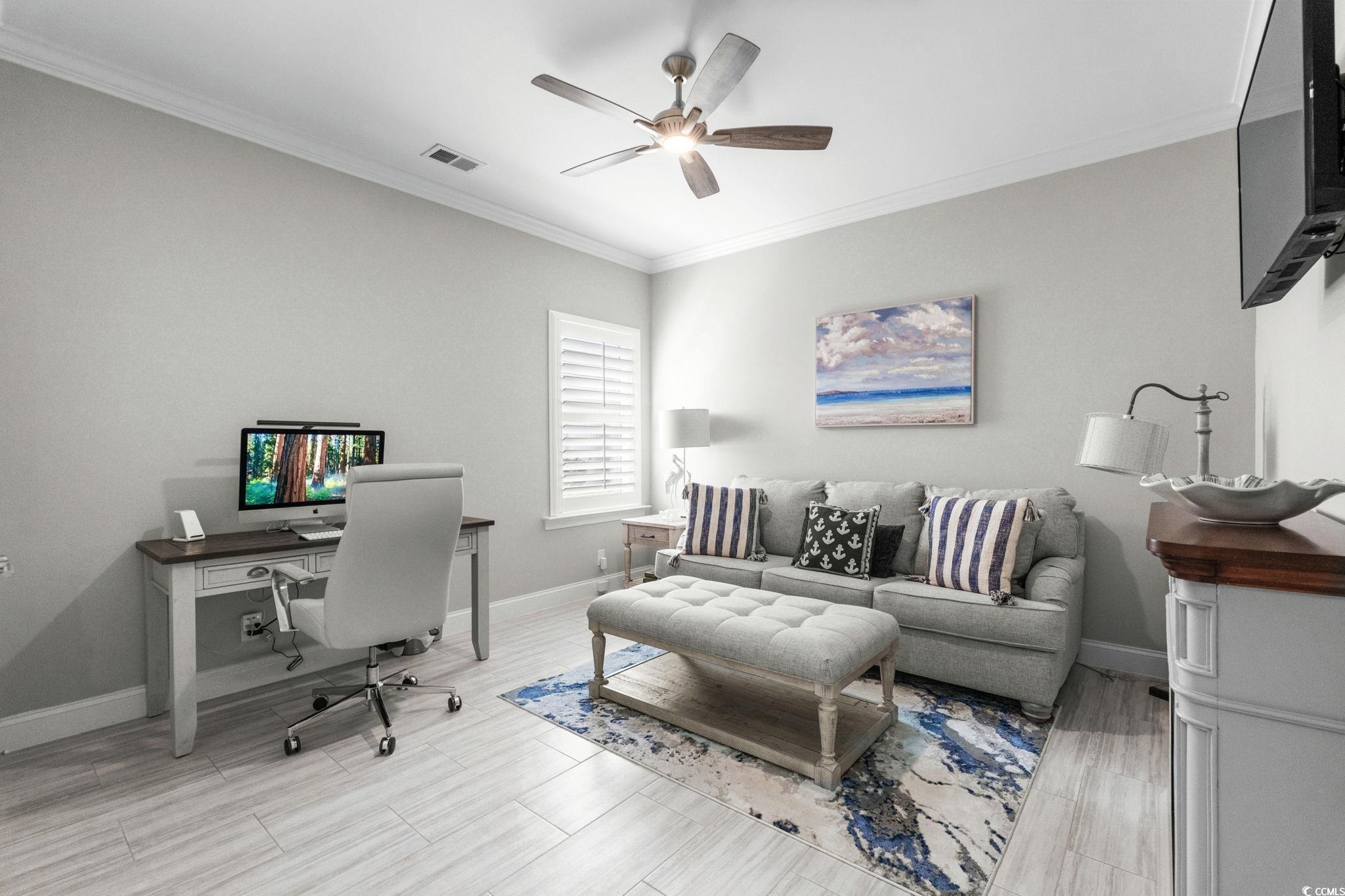 2225 Macerata Loop Myrtle Beach, SC 29579 - Photo 22 of 40 Home office featuring crown molding, a ceiling fan, and wood tiled floors