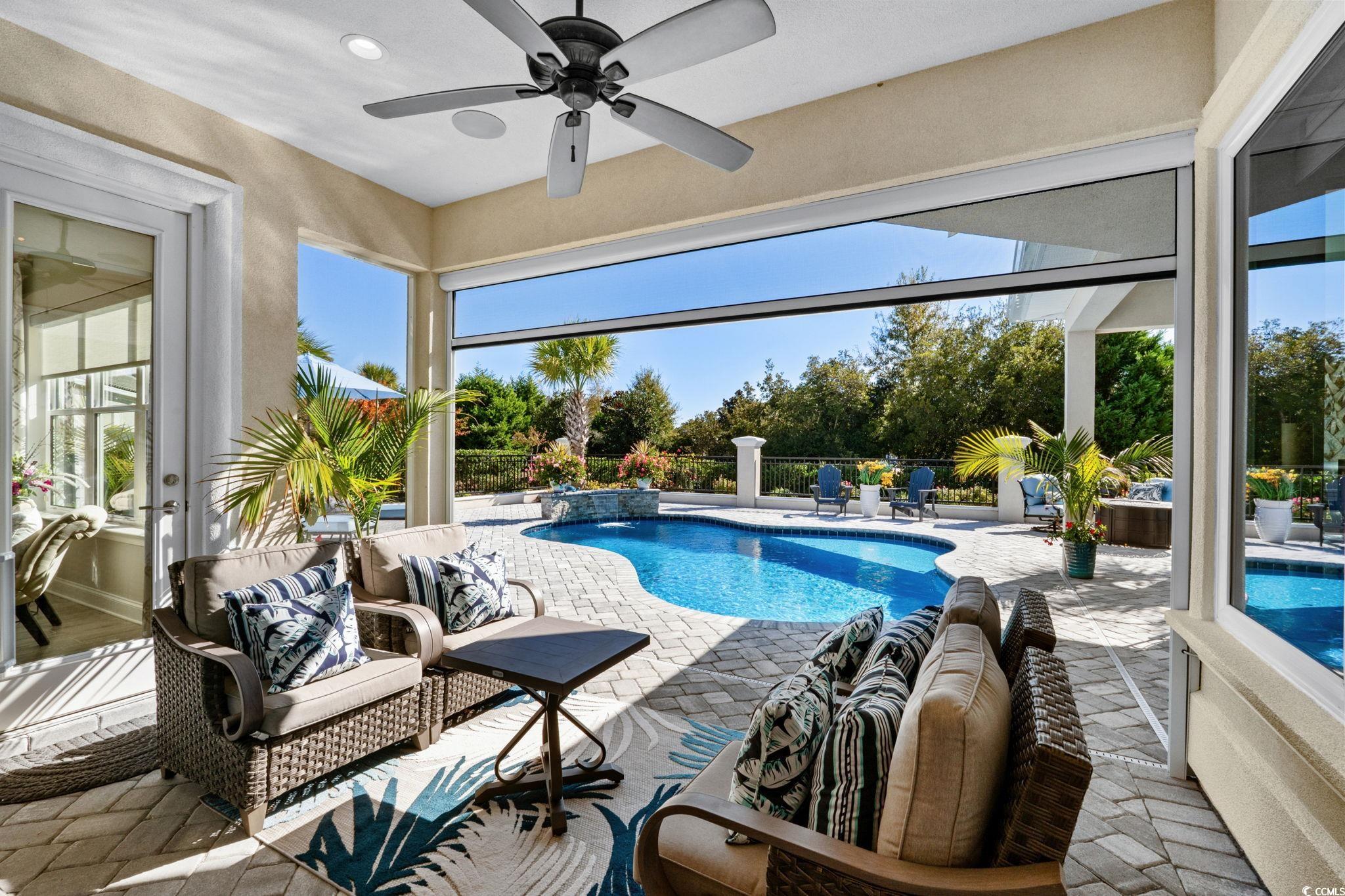 2225 Macerata Loop Myrtle Beach, SC 29579 - Photo 27 of 40 Swimming pool featuring a patio area and an outdoor hangout area
