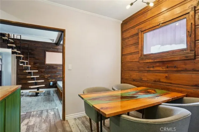 a kitchen with a sink cabinets and stainless steel appliances