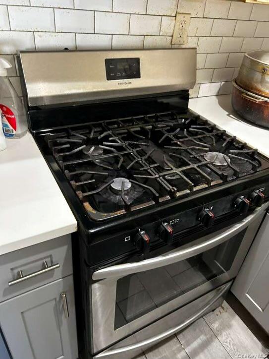 115-20 217th Street Queens, NY 11411 - Photo 8 of 8 a close up of stove top oven