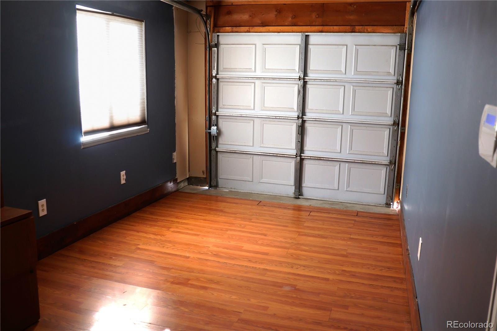 4939 East 124th Way Thornton, CO 80241 - Photo 17 of 24 a view of empty room with a window