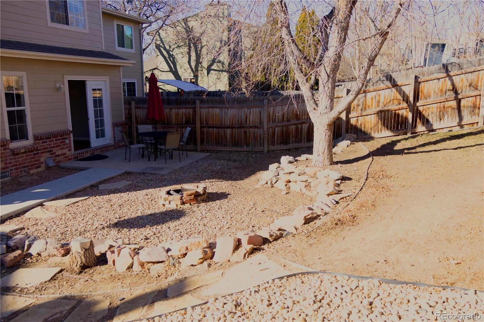 4939 East 124th Way Thornton, CO 80241 - Photo 19 of 24 a view of a covered with snow in the yard
