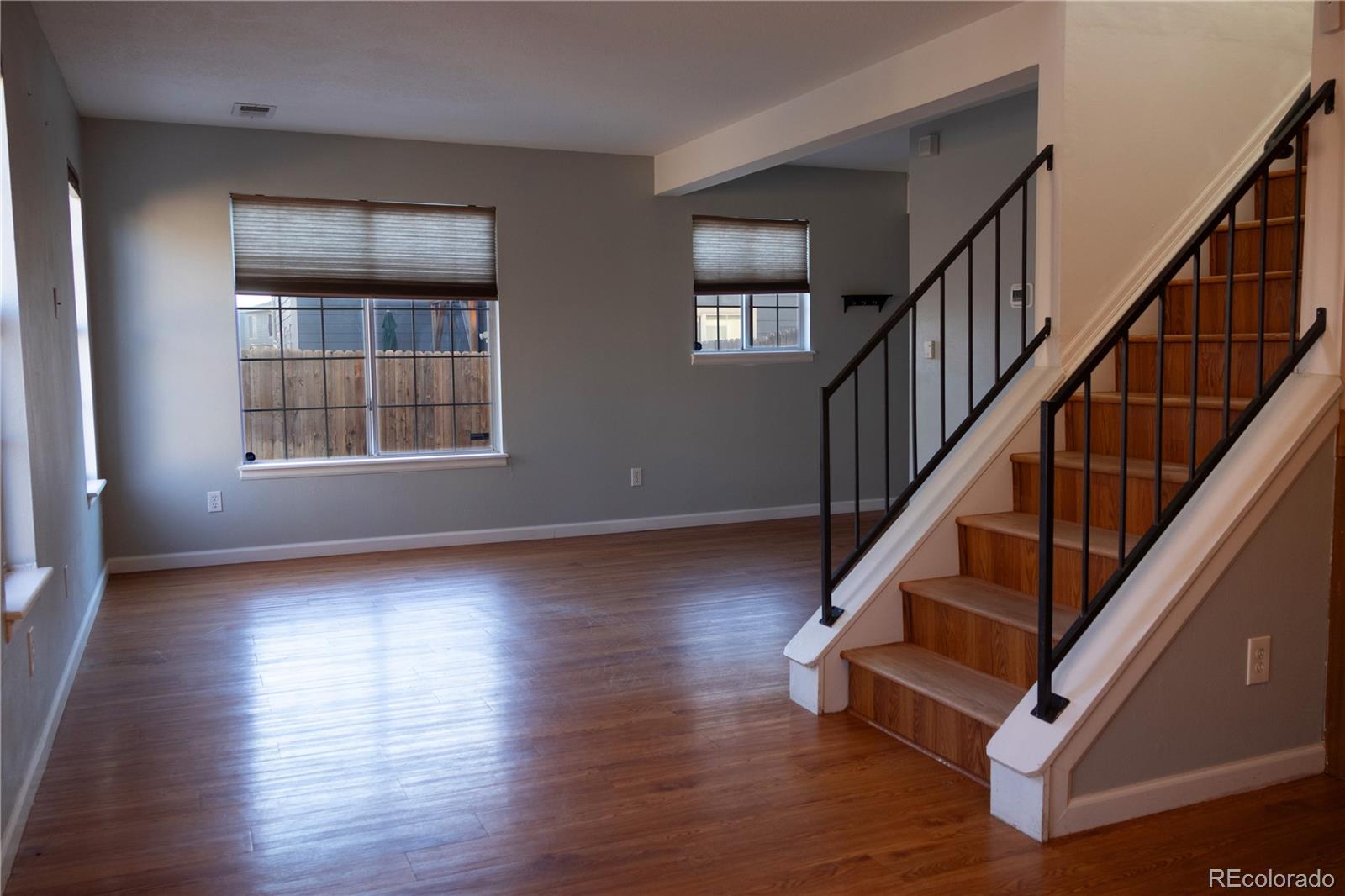 4939 East 124th Way Thornton, CO 80241 - Photo 3 of 24 a view of entryway and hall with wooden floor