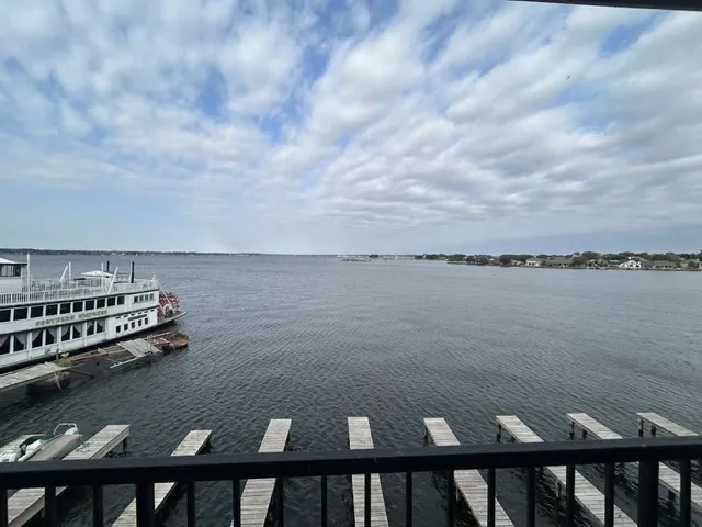 a view of a lake from a balcony