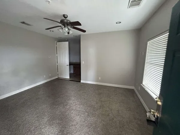 $1,895 | 7039 Kingston Cove Lane, Unit 303, Willis, TX 77318