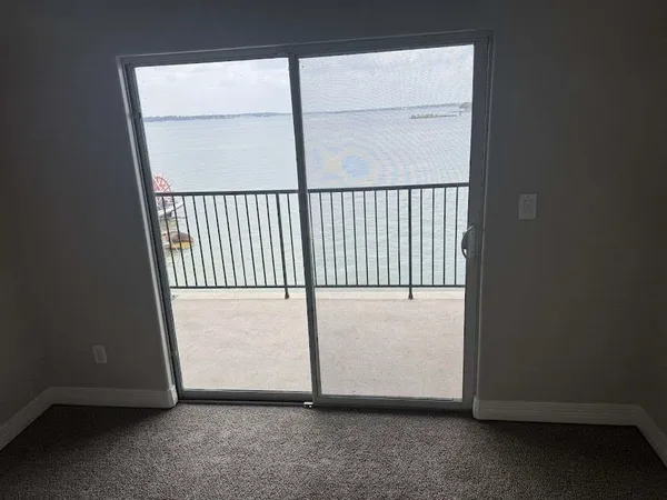 a view of a room with a large window