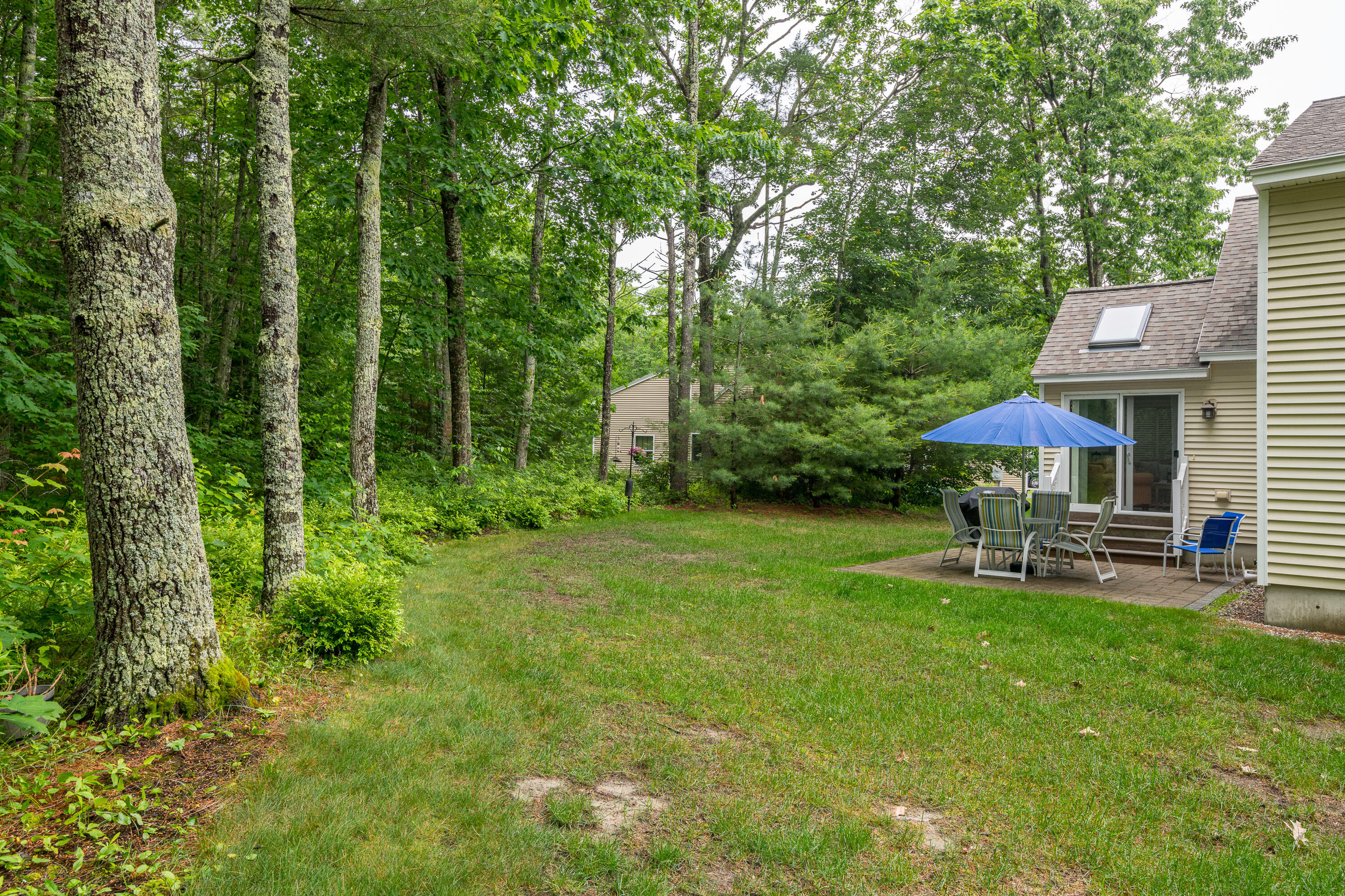 74 Windward Pointe Drive, Unit 74 Wells, ME 04090 - Photo 9 of 50 Back yard
