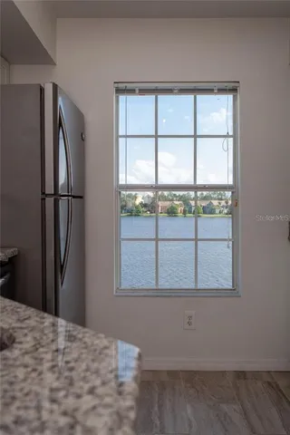 a close view of a faucet a sink and a mirror