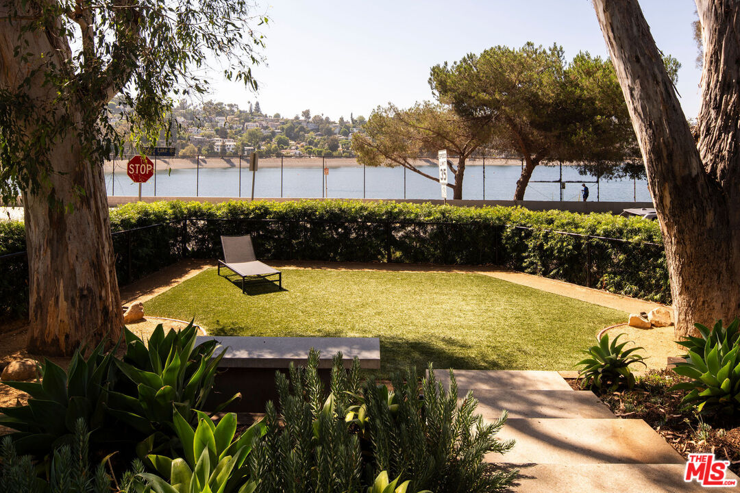 2371 Cove Avenue Los Angeles, CA 90039 - Photo 31 of 38 a view of a swimming pool with an outdoor space