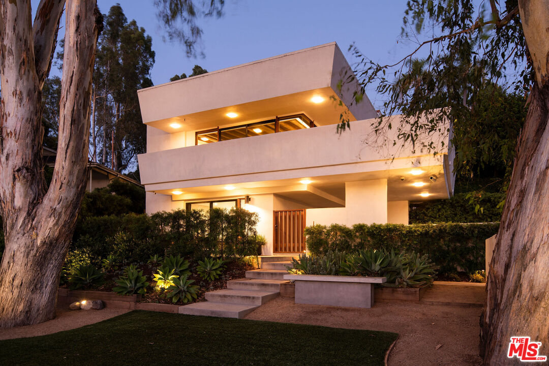 2371 Cove Avenue Los Angeles, CA 90039 - Photo 33 of 38 a view of a building with a yard