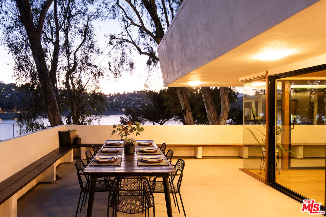 2371 Cove Avenue Los Angeles, CA 90039 - Photo 34 of 38 a view of a chairs and table in patio