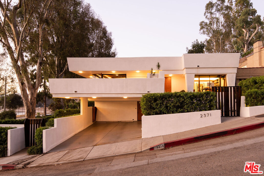 2371 Cove Avenue Los Angeles, CA 90039 - Photo 37 of 38 a view of a white building with a outdoor space