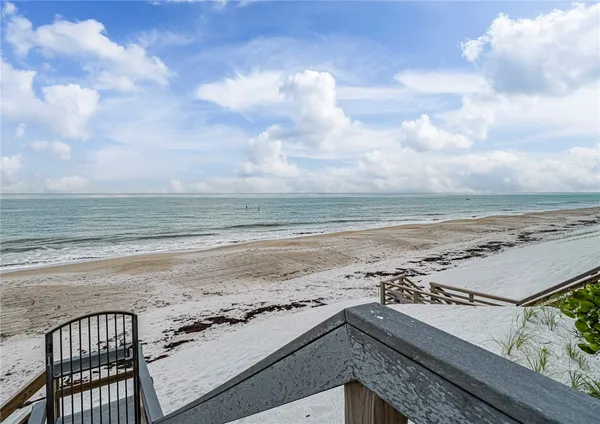a view of beach and ocean