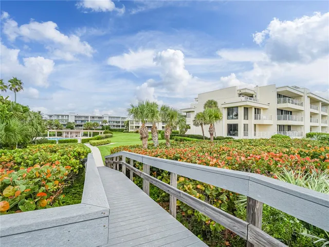 a view of a city with an ocean view