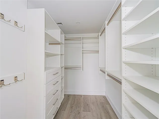 a kitchen with a sink and a stove top oven