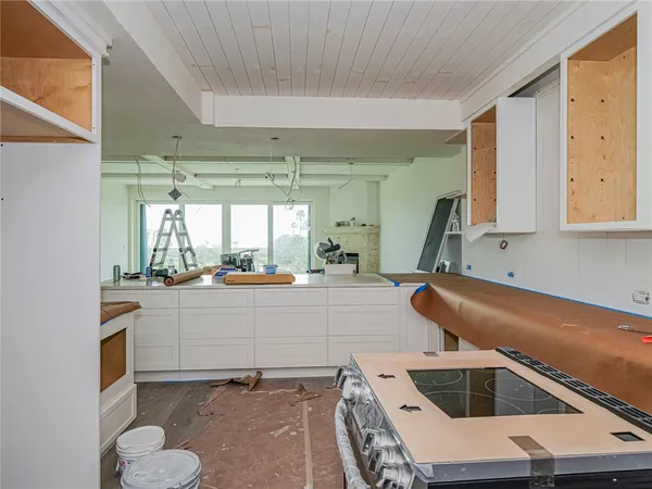 a view of parking garage with cars