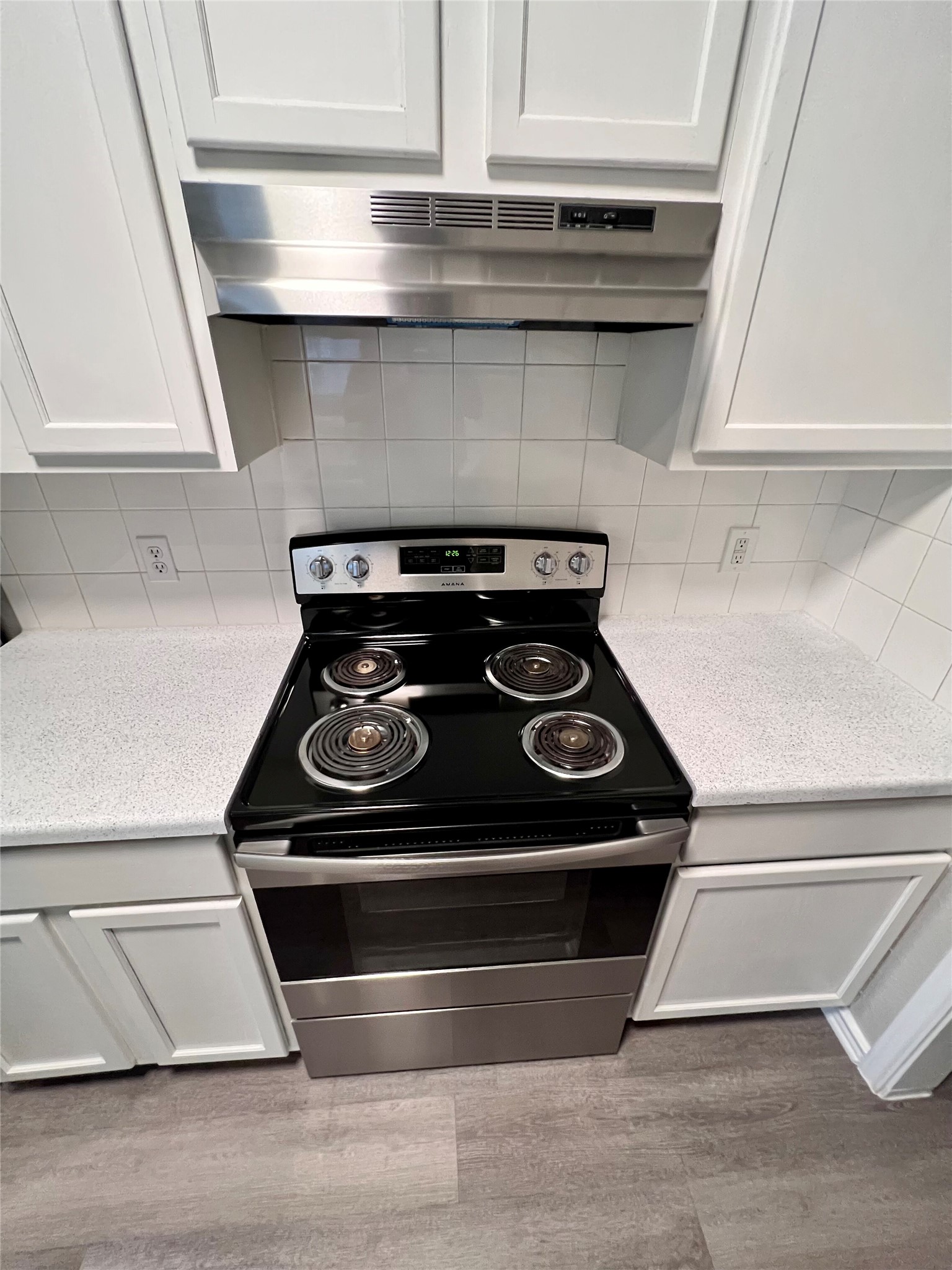 1801 Constantino Circle Austin, TX 78745 - Photo 5 of 22 a stove top oven sitting inside of a kitchen
