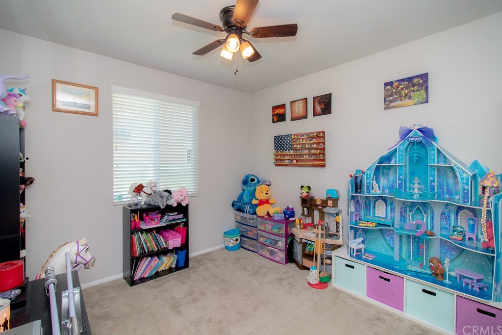 35251 Smith Avenue Beaumont, CA 92223 - Photo 20 of 33 a children room with toys and a book shelf