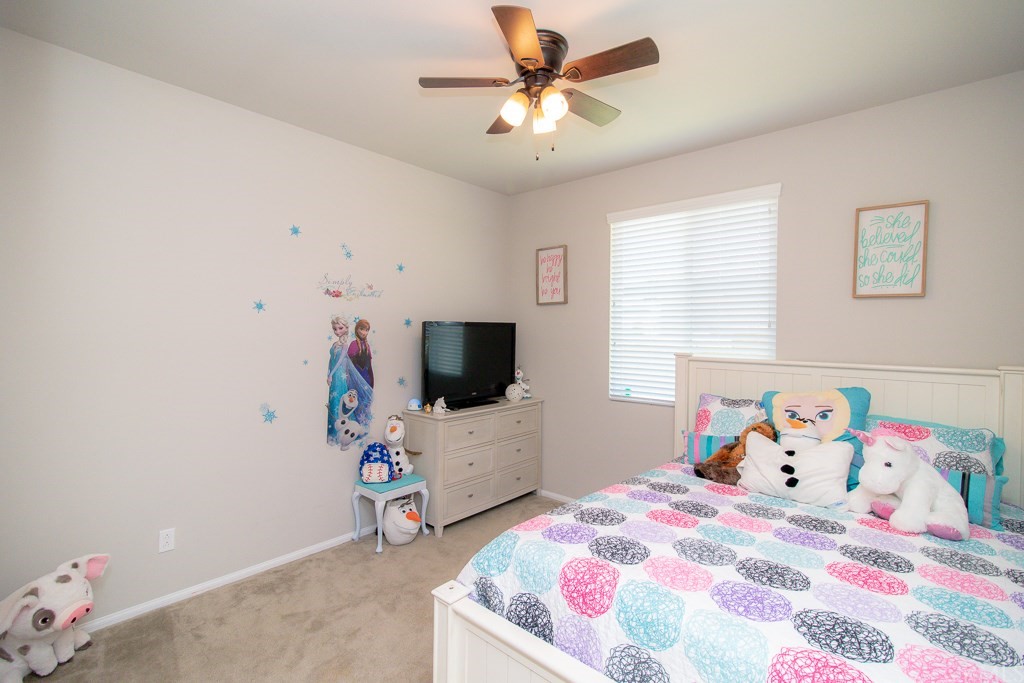 35251 Smith Avenue Beaumont, CA 92223 - Photo 22 of 33 a bedroom with a bed and a flat screen tv