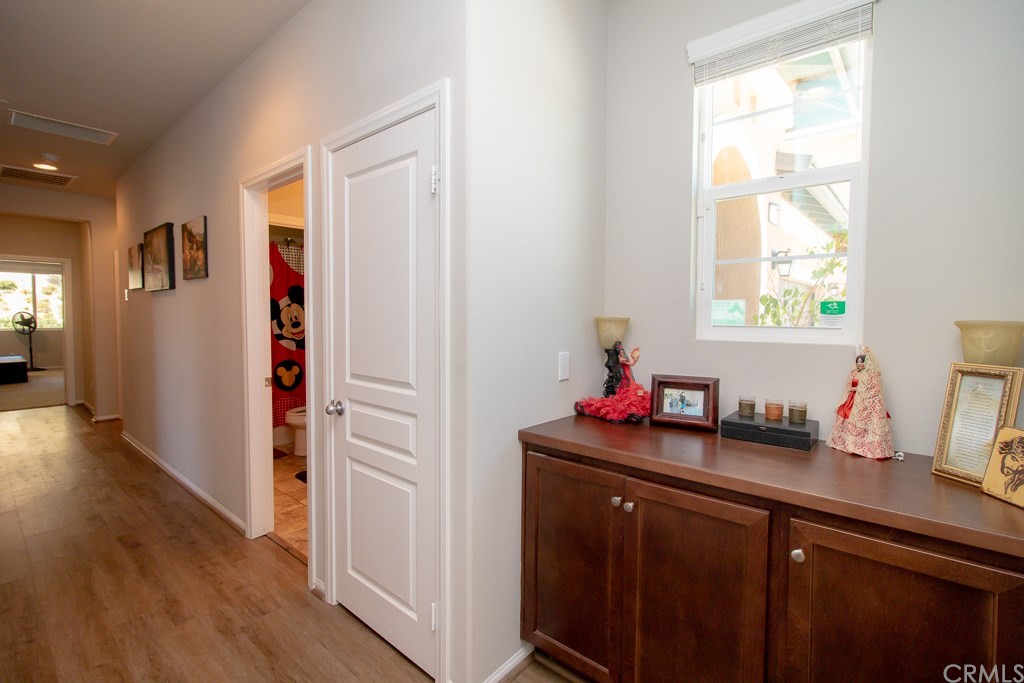 35251 Smith Avenue Beaumont, CA 92223 - Photo 26 of 33 a kitchen with sink cabinets and wooden floor