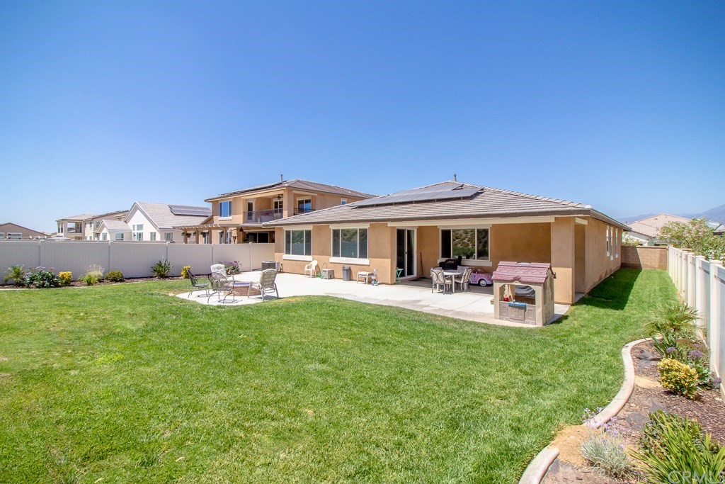 35251 Smith Avenue Beaumont, CA 92223 - Photo 29 of 33 a view of a house with backyard porch and sitting area