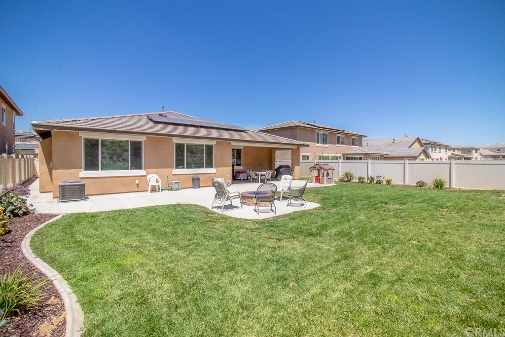 35251 Smith Avenue Beaumont, CA 92223 - Photo 30 of 33 a view of a house with backyard porch and furniture