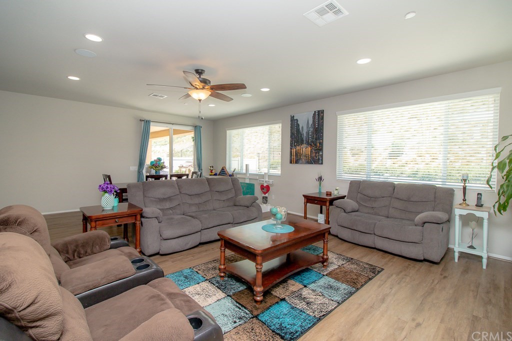 35251 Smith Avenue Beaumont, CA 92223 - Photo 8 of 33 a living room with furniture and a large window