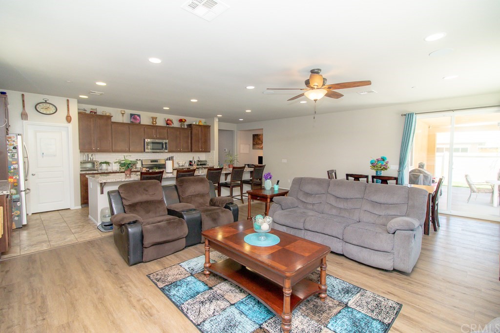 35251 Smith Avenue Beaumont, CA 92223 - Photo 9 of 33 a living room with furniture kitchen view and a large window