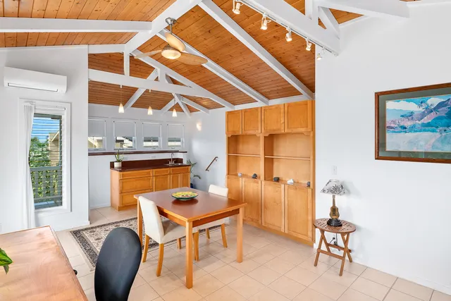 a workspace with furniture and a window