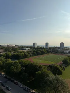 a view of a golf course with a lake