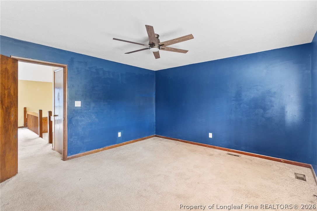 6009 Dalton Road Fayetteville, NC 28314 - Photo 19 of 36 a view of a room with a ceiling fan