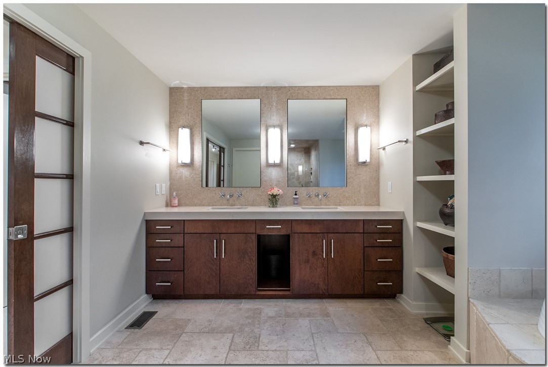 29600 Edgedale Road Cleveland, OH 44124 - Photo 18 of 31 A double vanity and tumbled-stone floor add an air of Zen to the master bath.