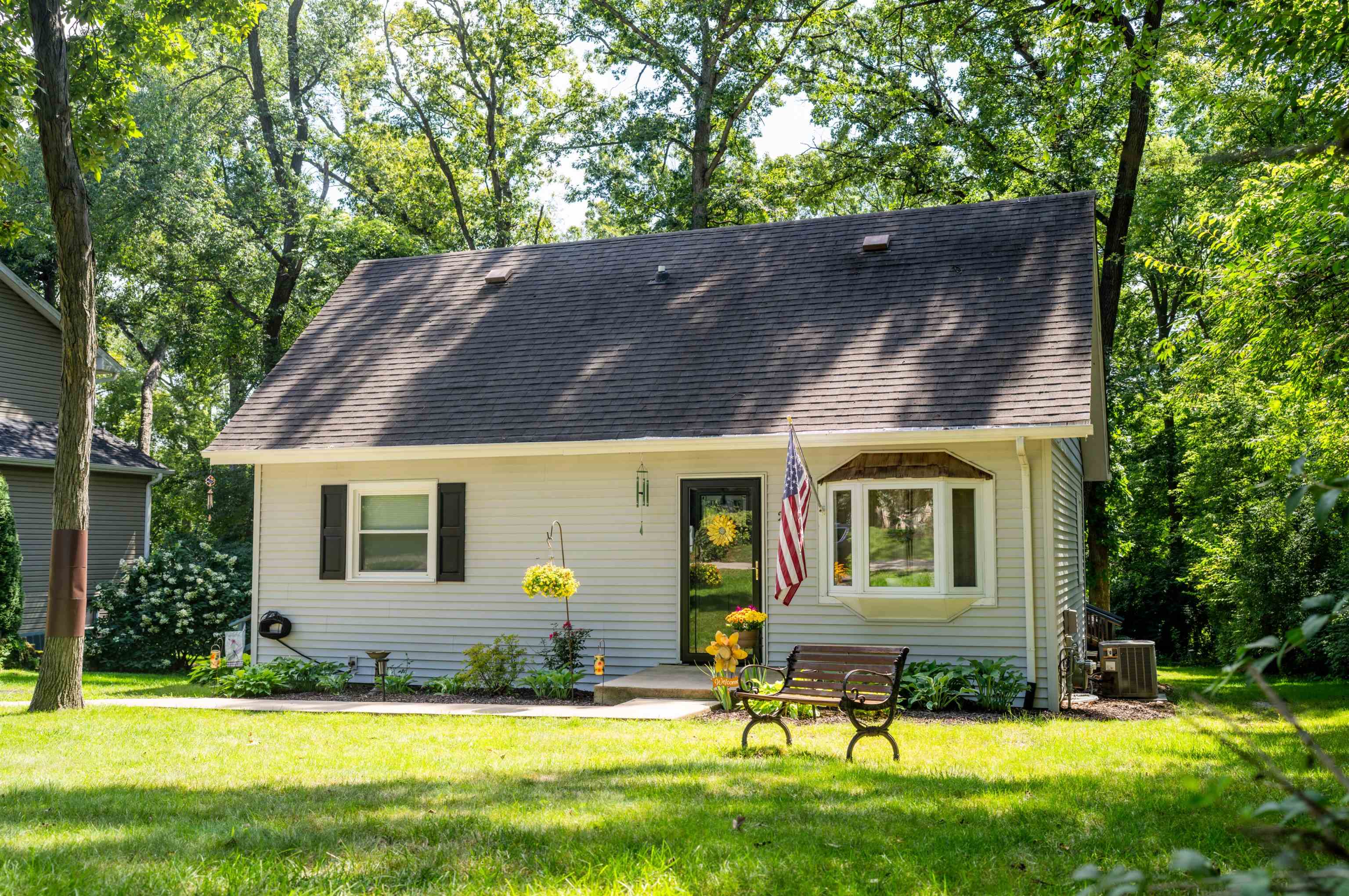 237 Rochester Road Northeast Poplar Grove, IL 61065 - Photo 1 of 28 a view of a house with a swimming pool