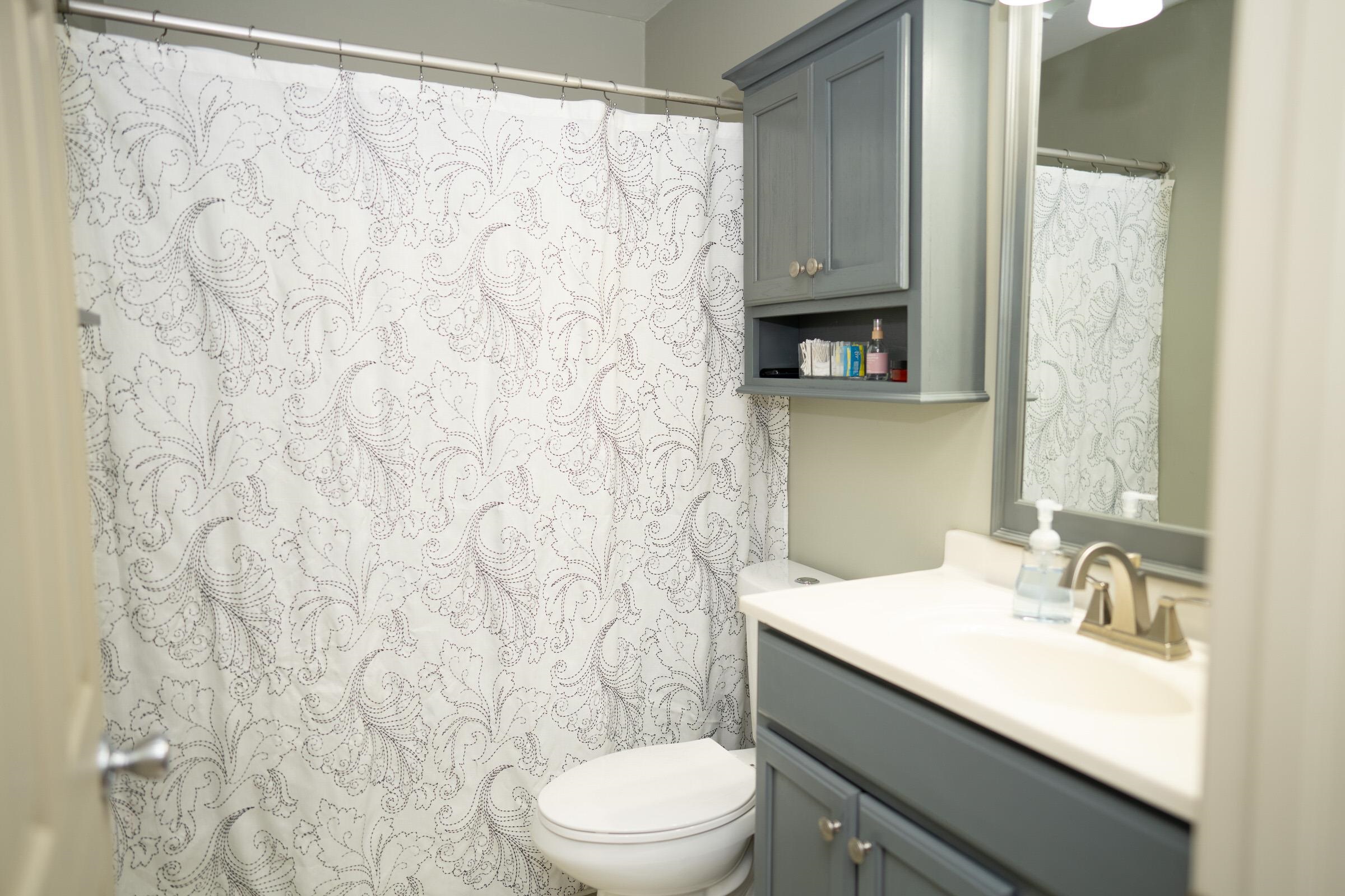 237 Rochester Road Northeast Poplar Grove, IL 61065 - Photo 13 of 28 a bathroom with a sink toilet and vanity