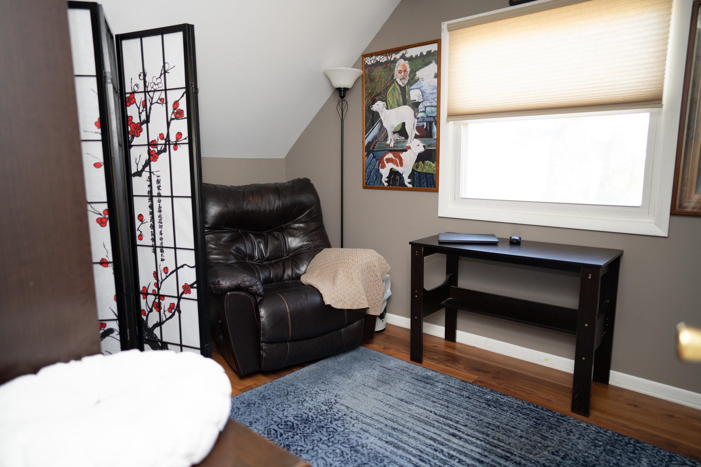 237 Rochester Road Northeast Poplar Grove, IL 61065 - Photo 18 of 28 a living room with furniture piano and a window