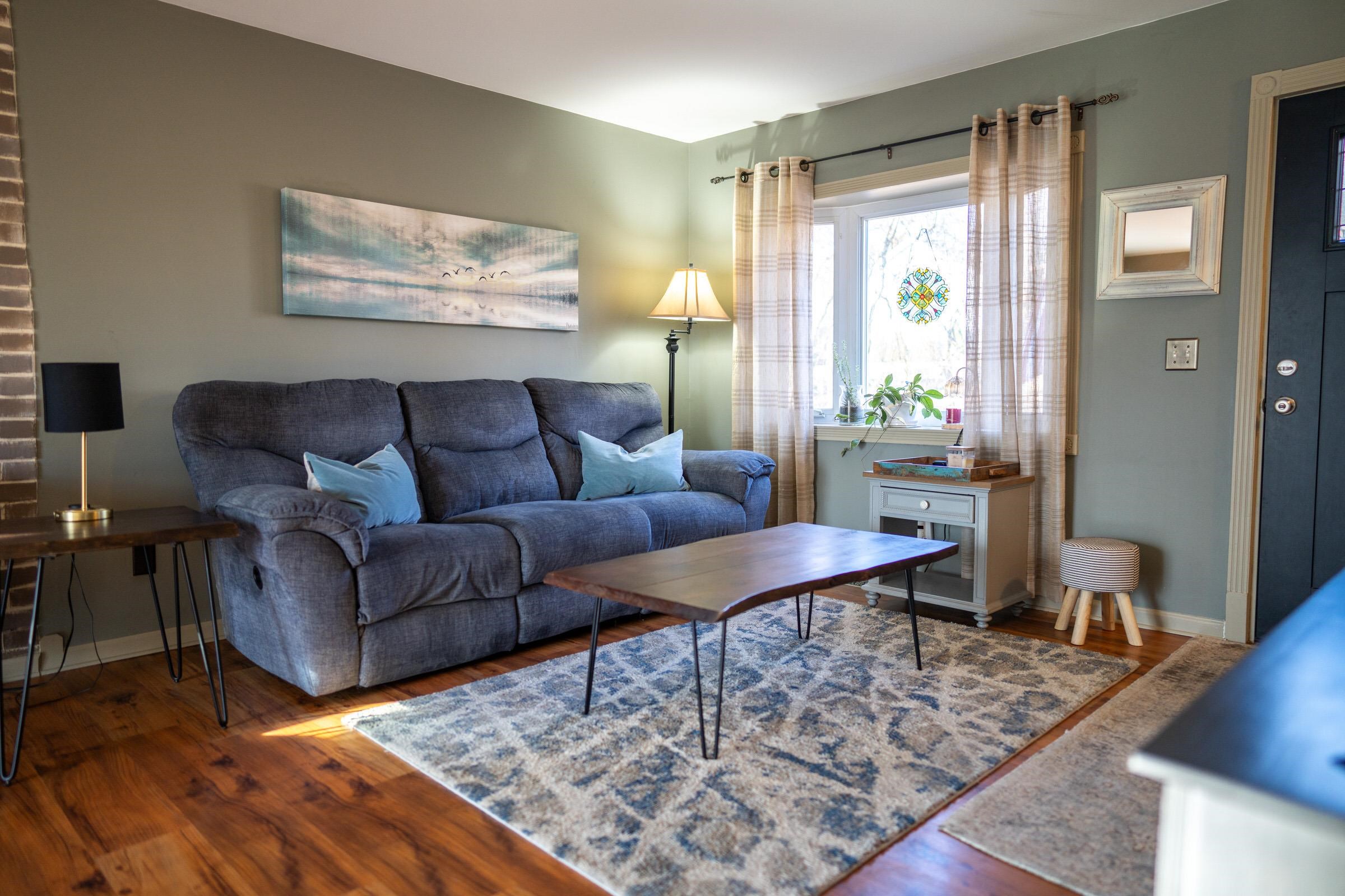 237 Rochester Road Northeast Poplar Grove, IL 61065 - Photo 9 of 28 a living room with furniture and wooden floor