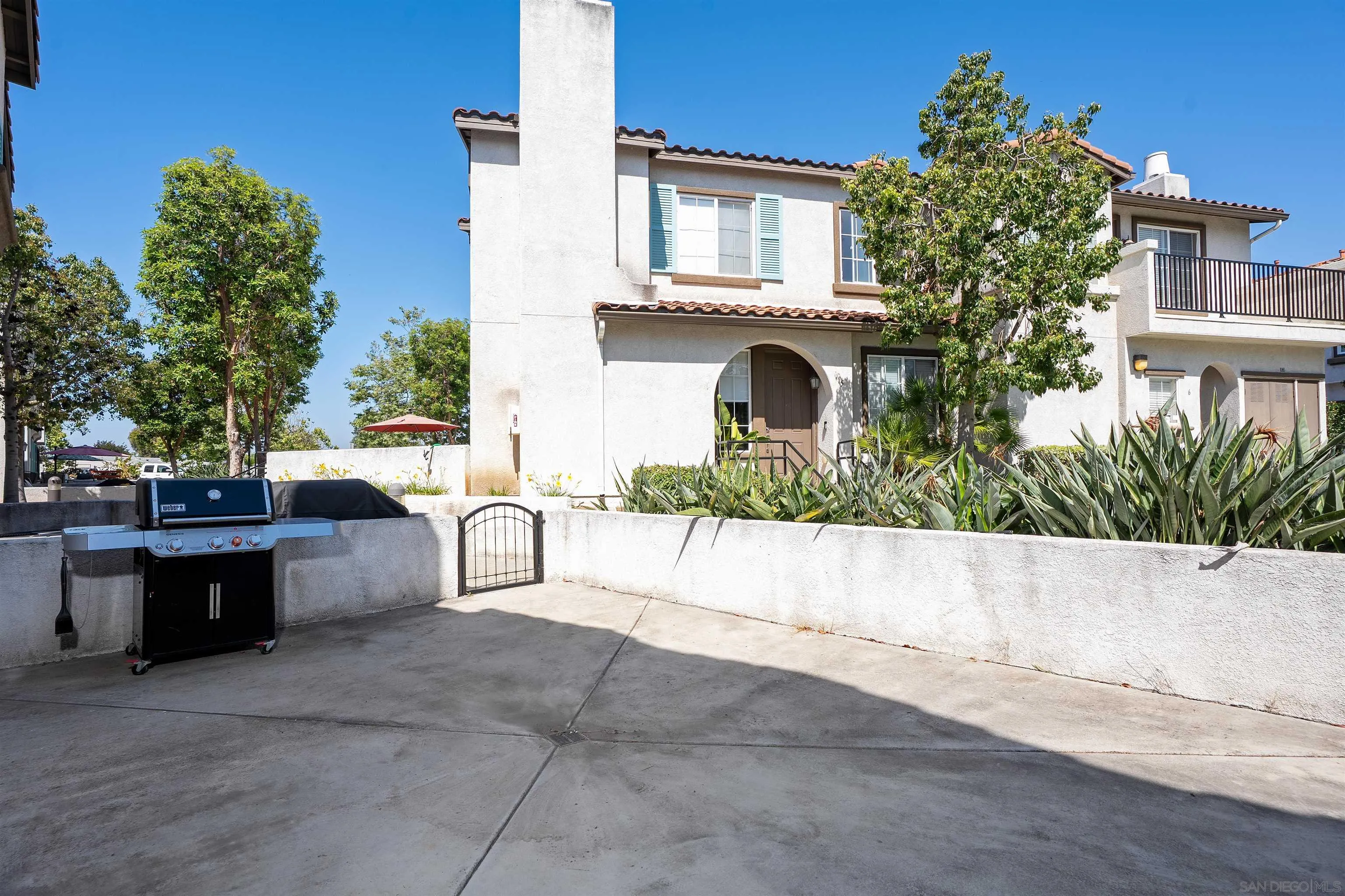 289 Reef Point Way, Unit 3 Oceanside, CA 92058 - Photo 19 of 23 a house view with a outdoor space