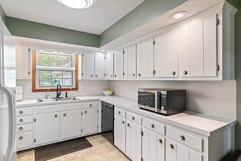 2300 Raspberry Lane Lebanon, TN 37087 - Photo 13 of 48 a kitchen with cabinets appliances a sink and a window