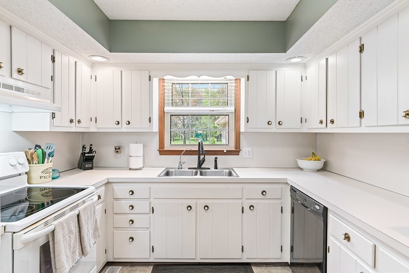 2300 Raspberry Lane Lebanon, TN 37087 - Photo 14 of 48 a kitchen with cabinets appliances a sink and a window