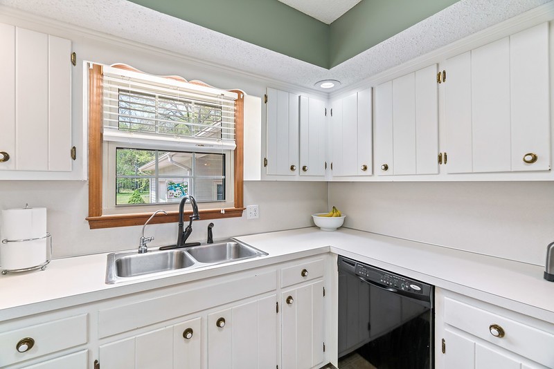 2300 Raspberry Lane Lebanon, TN 37087 - Photo 15 of 48 a kitchen with white cabinets and a window