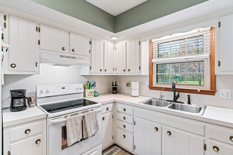 2300 Raspberry Lane Lebanon, TN 37087 - Photo 16 of 48 a kitchen with cabinets appliances a sink and a window
